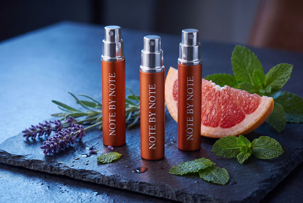 Three Note by Note travel sprays with lavender, grapefruit and mint on slate