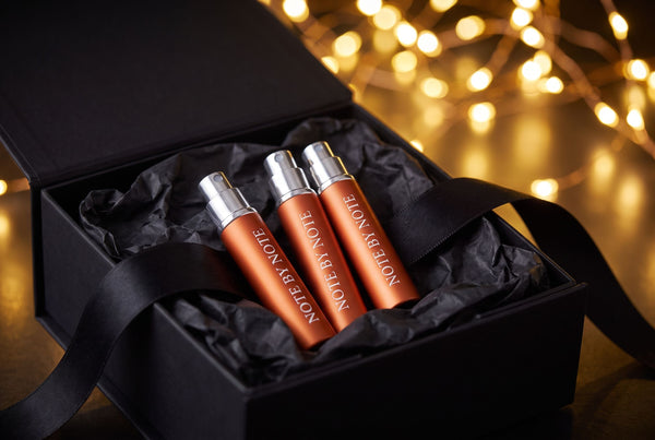 Gift box with three Note by Note travel sprays and festive lights