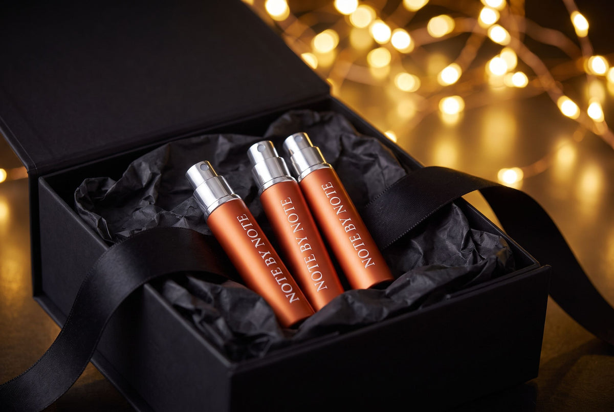 Gift box with three Note by Note travel sprays and festive lights